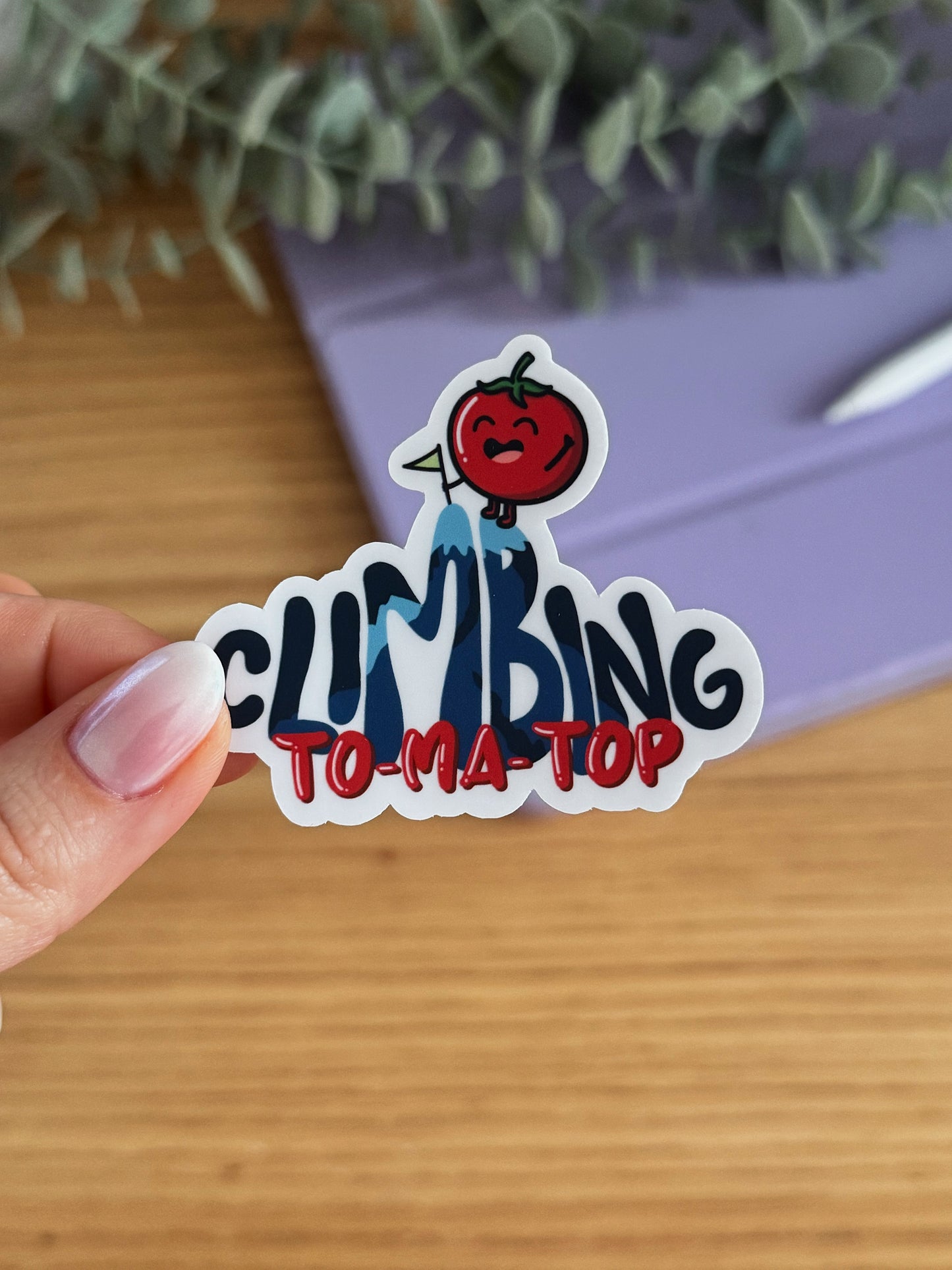 Climbing to-ma-top Sticker